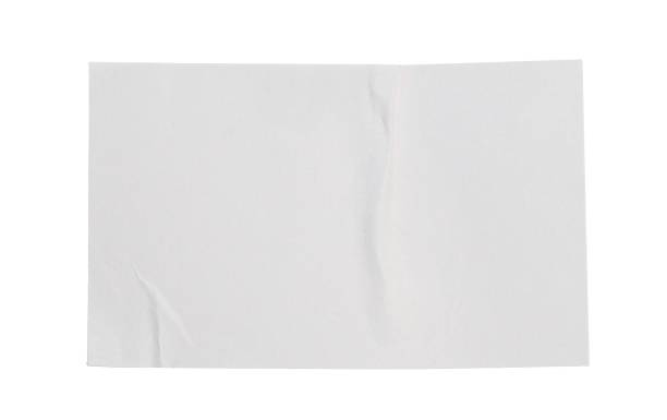 istock Crumpled white paper empty sticker mockup sheet, transparent background revealing intricate wrinkled surface and delicate texture 2202274725