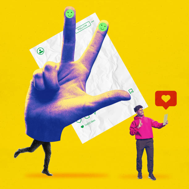 istock Walking hand making peace sign, with smiling man making social media post in background. Positive interaction 2202279394