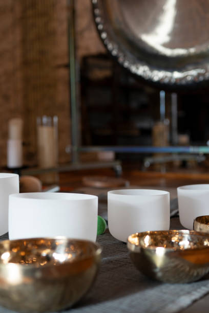istock Singing and quartz crystal bowls and gong 2202280108
