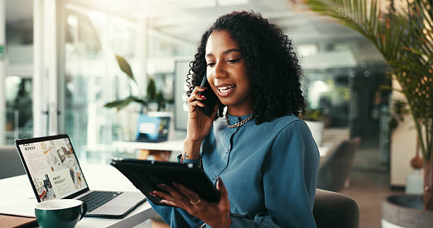 istock Business woman, designer and phone call with tablet for online communication or tech support at office. Female person, employee or consultant talking on mobile smartphone with technology at workplace 2202281048