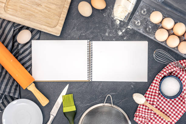 istock Background with baking ingredients and blank book. Baking ingredients. 2202281278