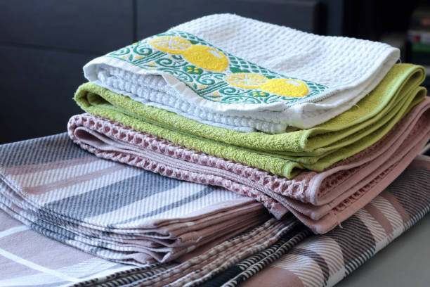 istock Clean after washing waffle kitchen towels, flannel plaid linens. 2202281423