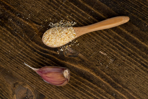 dried garlic fruits for cooking close up, dried spices from very small pieces of garlic fruits, dehydrated