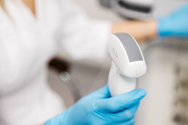 istock Close-up of a doctor's hands preparing an ultrasound probe before diagnosis. 2202282865