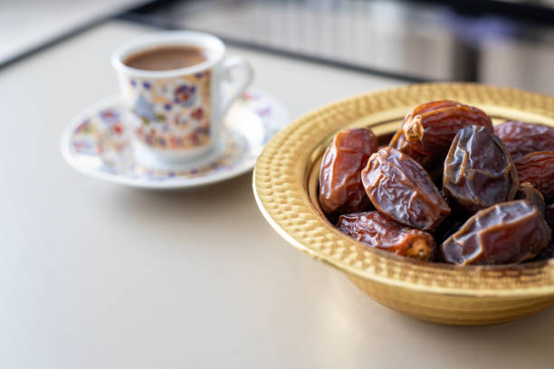 Dates fruit in a bowl. Happy Ramadan Kareem