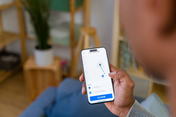 istock Man using navigating app on smartphone to reach city center 2202292644