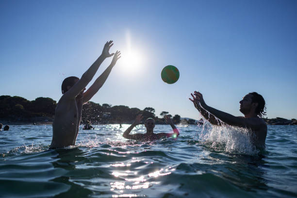 Yellow balls floating in a swimming pool