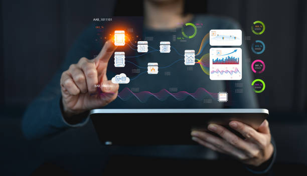 istock A person interacts with holographic data displays, showcasing modern technology and digital interfaces in a sleek, futuristic setting. 2202295470