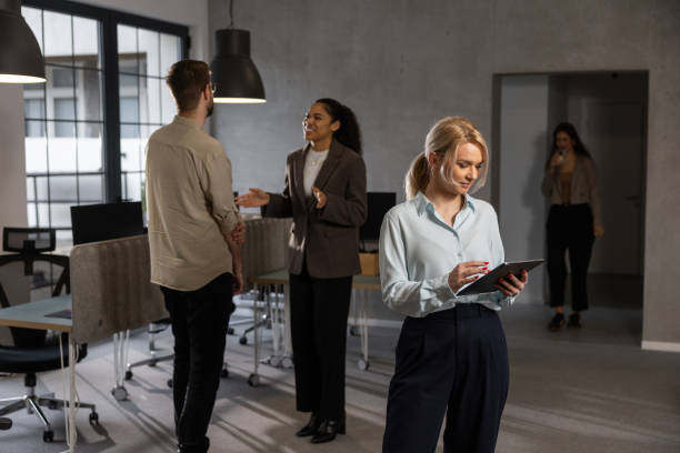 istock Businesspeople in modern office 2202296973