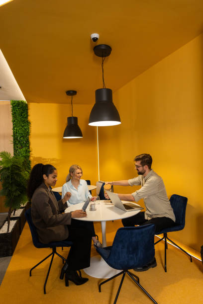 istock Young businesspeople working in modern office 2202297233