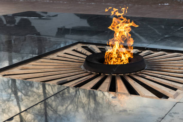 A symbolic eternal flame burning in a circular structure