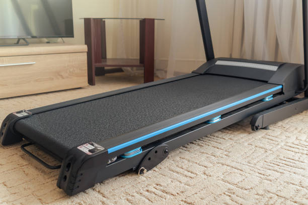 istock Treadmill in the room. Home workouts. 2202305256