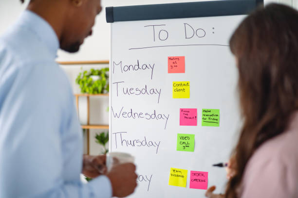istock Team Collaborating with Sticky Notes in Office Meeting 2202309086