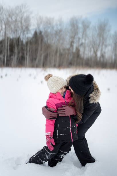 istock Mother & Daughter Snow Day 2202309791
