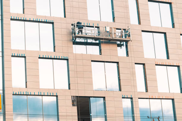 istock high up platform working people development industrial occupation skyscraper building exterior facade 2202327757