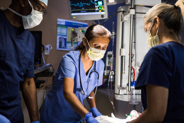 istock Teamwork in the Emergency Room: Doctors and Nurses 2202327881
