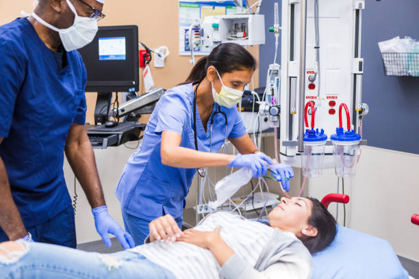 istock Nurse Assisting Patient in Hospital Room 2202327891