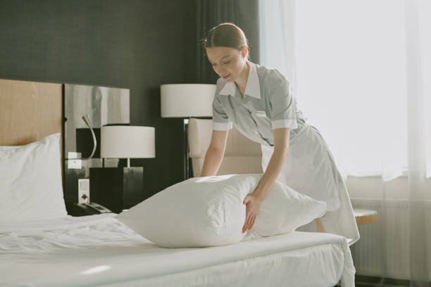istock Chambermaid in Hotel Room 2202328178