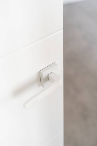 istock Modern minimalist door handle design in a stylish apartment interior 2202330227