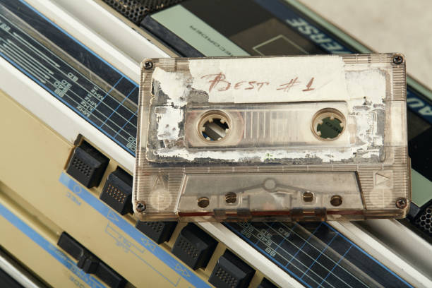 Audio cassette tape on a boom box retro cassette player from 90's