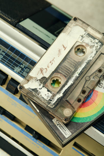 Audio cassette mix tape on a boom box retro cassette player from 90's