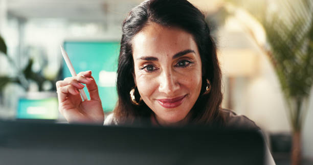 Business, thinking and woman with ideas, laptop and problem solving with wonder, thoughtful and solution. Person, consultant and employee in workplace, smile and online reading for project and email