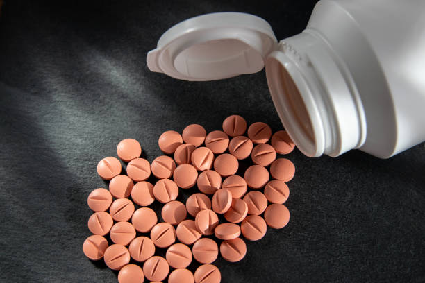 Much medical pills and drugs in white bottle. Healthcare concept. BAA or biologically active additives.