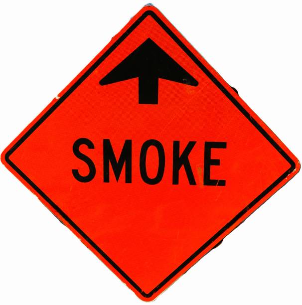 istock A diamond shaped, red and orange, trafic caution sign. 2202336907