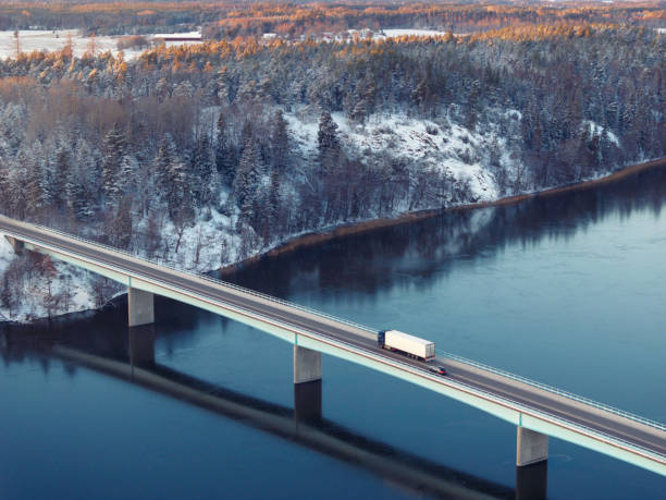 A truck crossing a highway bridge on E18 in Uppland, Sweden.