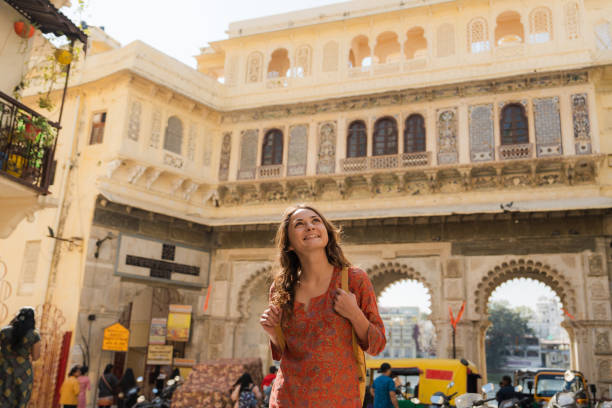 istock Woman exploring Udaipur city during trip to India 2202349019