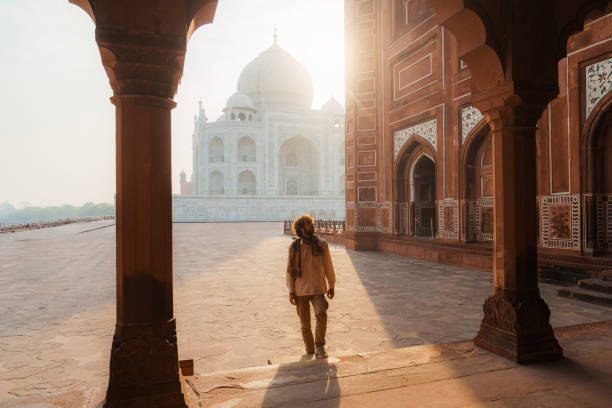 istock Man exploring Taj Mahal during trip to India 2202349809