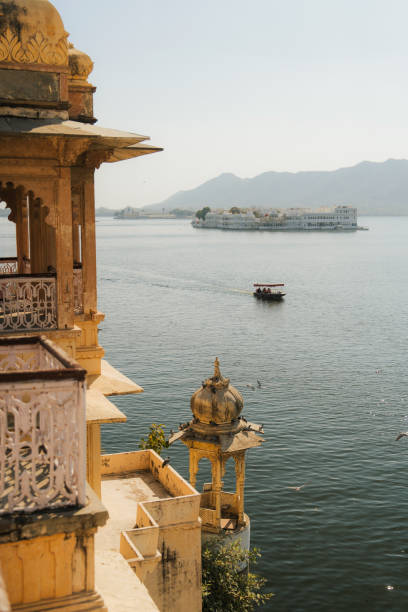 istock Udaipur architecture at Lake Pichola at sunset 2202349928