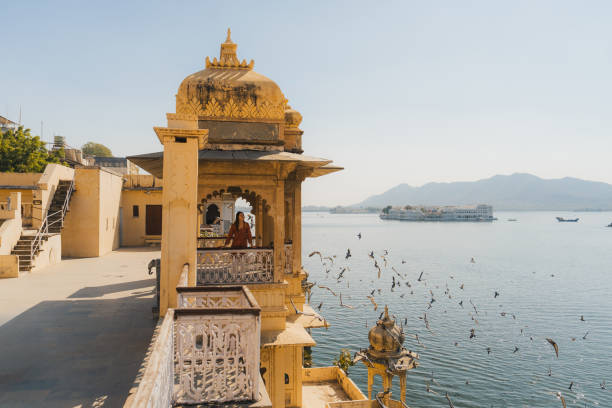 istock Woman exploring Udaipur city during trip to India 2202350067