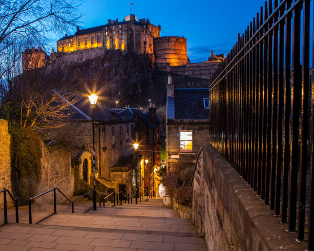 Edinburgh, Scotland - February 15th 2023: The magnificent Edinburgh Castle viewed from the Vennel in the city of Edinburgh in Scotland, UK.