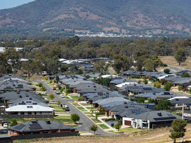 istock Suburban houses close together 2202359914