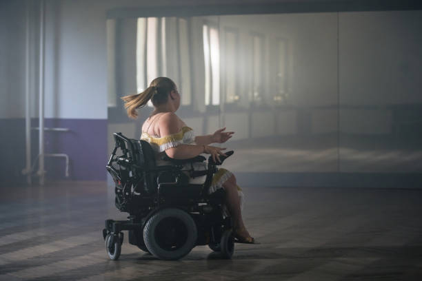 istock Woman with disability training for a competition, performing solo freestyle dance 2202362733
