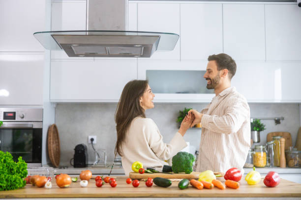 istock Playful Cooking Moment in Kitchen Bliss 2202363389