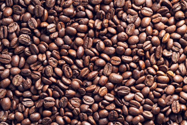 Top View of Aromatic Roasted Coffee Beans Background