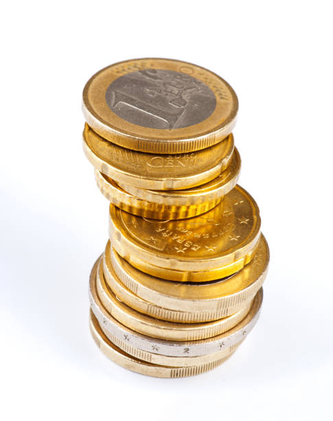 istock Stack of euro coins balancing on white background representing savings 2202371596