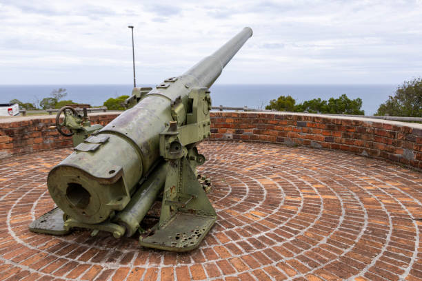 View of the WWII guns that stand sentinel at the summit of the historic strategic lookout point of Ouen Toro Park in Noumea, Grande Terre Island, New Caledonia,