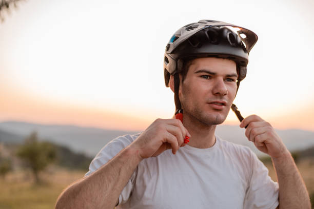 istock A young male cyclist is getting ready for ride. 2202375886