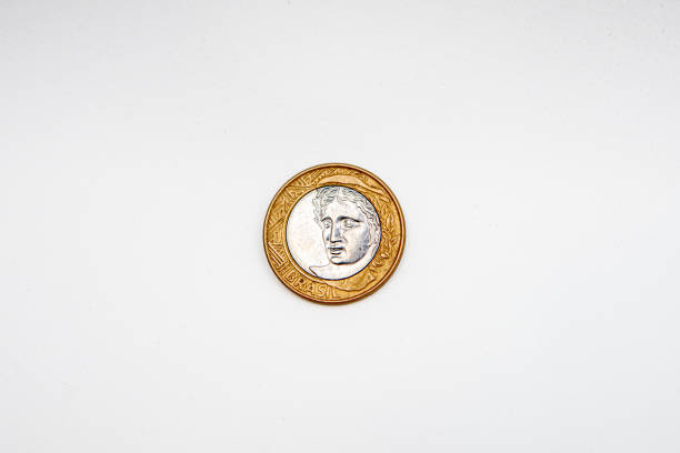 istock commemorative 1 real coin on a white background in rio de janeiro. 2202379556