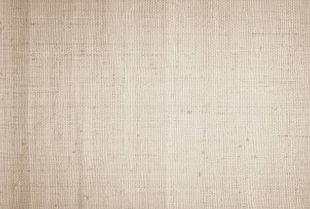 istock Brown sackcloth woven texture background in natural pattern. Jute hessian burlap, linen background in light beige cream color blank. Weaving canvas fiber line cotton cloth textured as organic. 2202380473