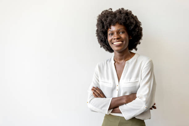 istock Confident Professional Woman Smiling Against Plain Background 2202380535