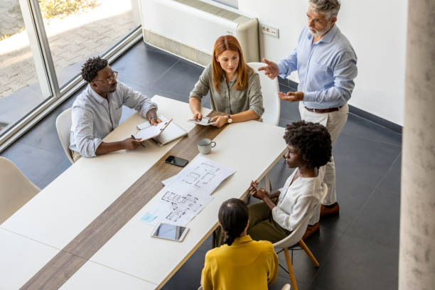 istock Diverse Team in a Business Meeting Collaborating on Project 2202380571