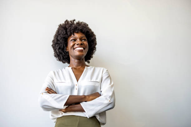istock Confident Businesswoman Smiling in Stylish Office Setting 2202380606