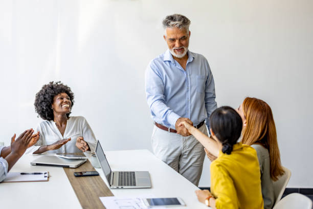 istock Diverse Business Team Celebrating a Successful Collaboration 2202380636