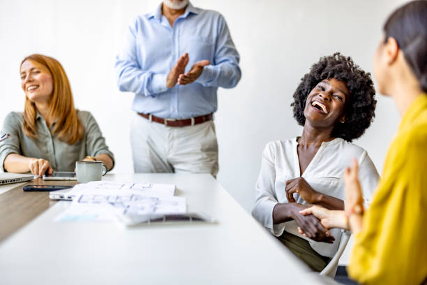 istock Diverse Team Celebrating Success in Office Environment 2202380669