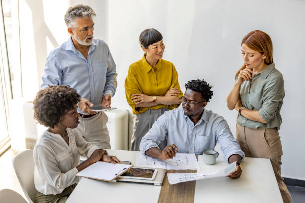 istock Diverse Team Collaborating During an Office Meeting Discussion 2202380680