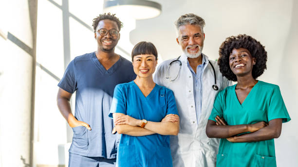 istock Diverse Medical Team Smiling in Hospital Environment 2202382714